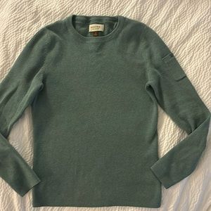 Super cute sweater with adorable pocket detail on sleeve